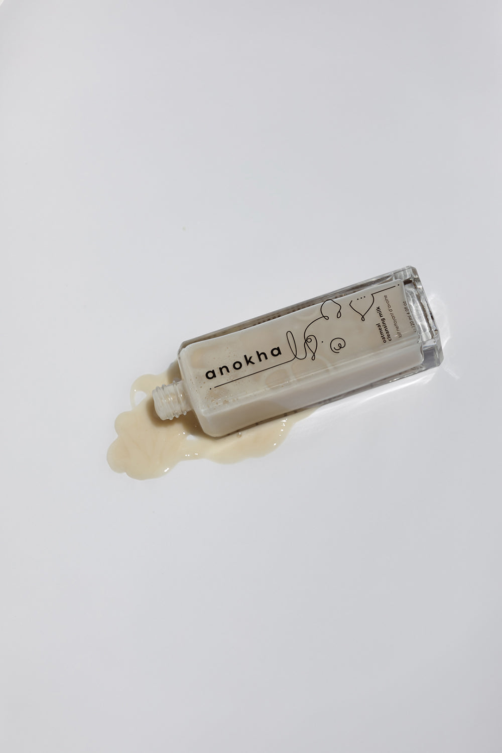 anokha skincare product with a small amount of cream on a white background