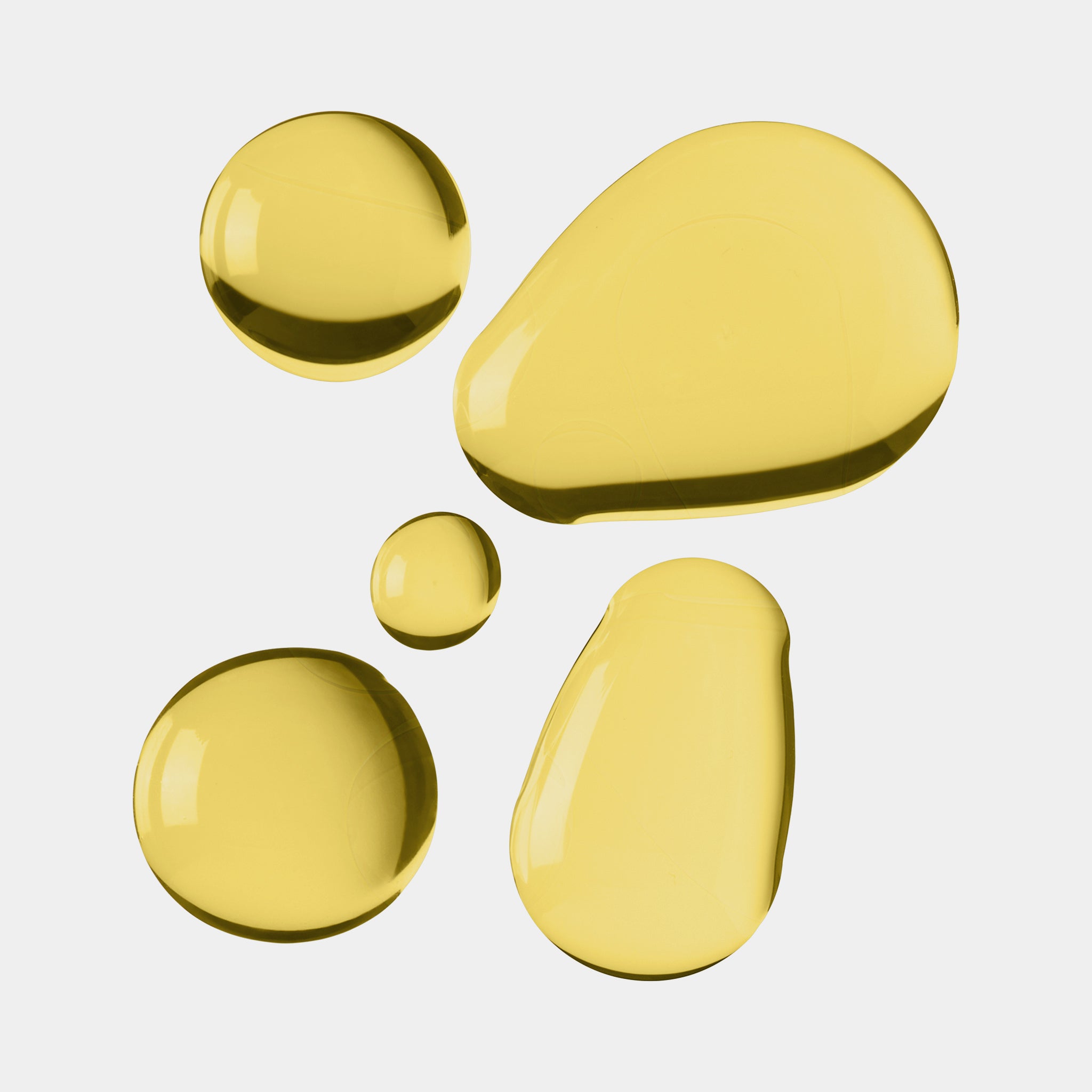 Yellow droplets on a light gray background